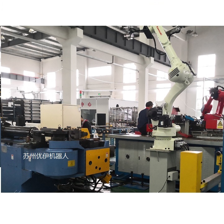 Video of HJM Pipe Bender w Kawasaki Robot Loading and Unloading